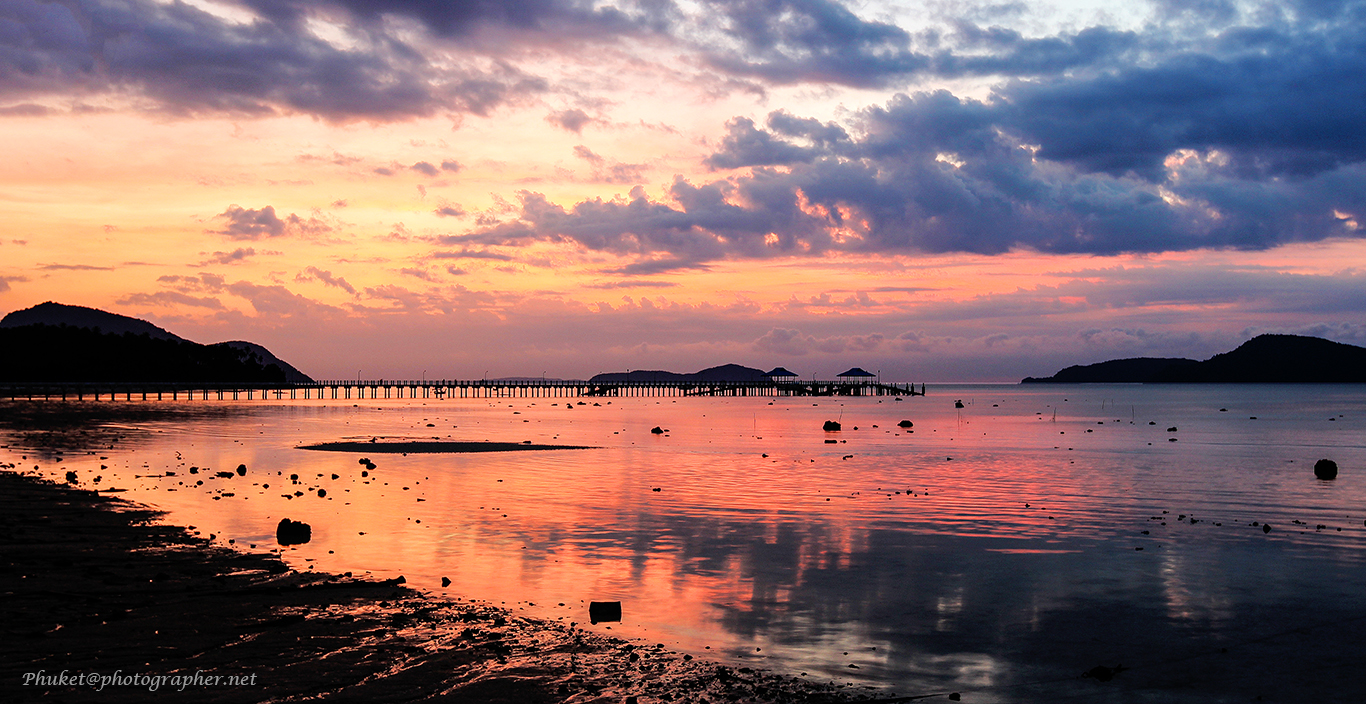 Sunrise over Rawai waterfront and pier