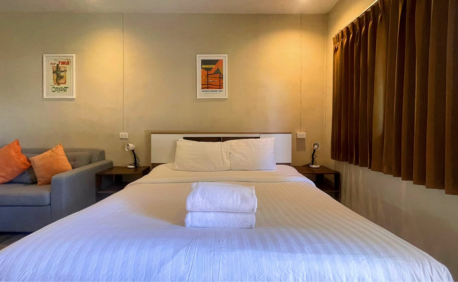 King room with sofa and blackout curtains